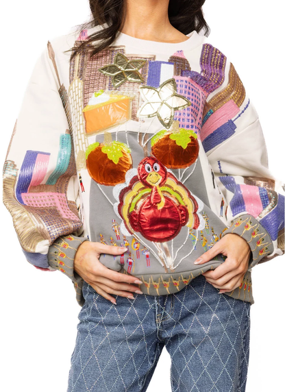 QOS THANKSGIVING PARADE SWEATSHIRT