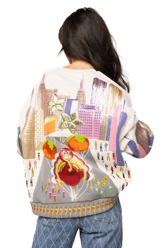 QOS THANKSGIVING PARADE SWEATSHIRT
