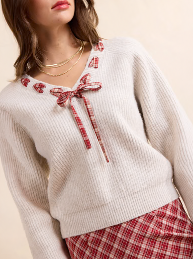 SS HOSTESS PLAID TRIM SWEATER